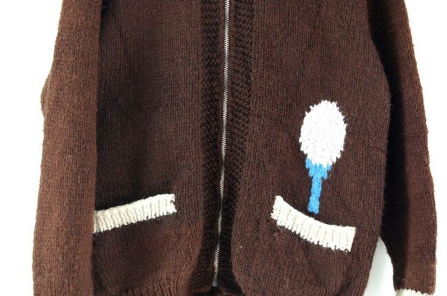 Close up of Cowichan Sweater Golf Themed