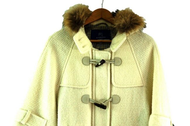 Close up of Womens White Burberry Blue Label Duffel Coat