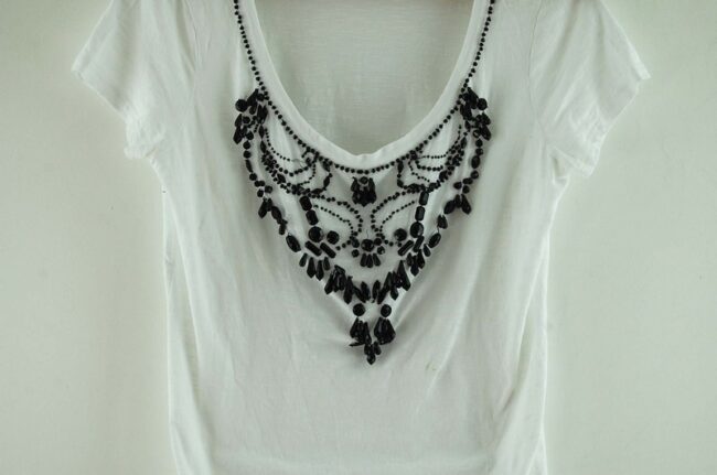 Close up of White Beaded Liu Jo T Shirt