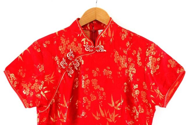 Close up top front of Red And Gold Chinese Dress