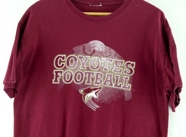 Close up of Maroon Coyotes Football Tee