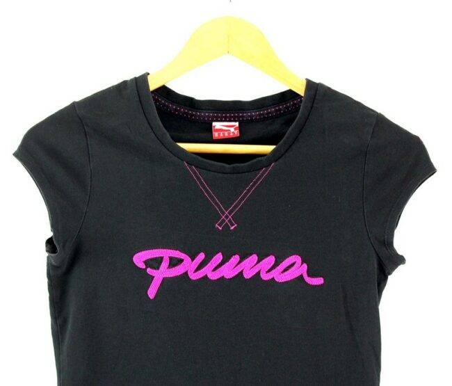 Close up of womens Puma Black Tshirt