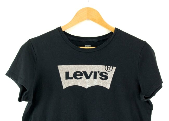 Close up of Womens black Levis Tee