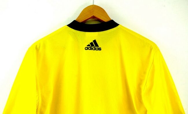 Close up of Yellow T Shirt Adidas