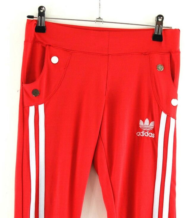 Close up of Red Adidas stripe Leggings