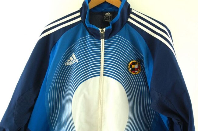 Close up of Blue Real Federacion Española De Futbol Adidas Training Top