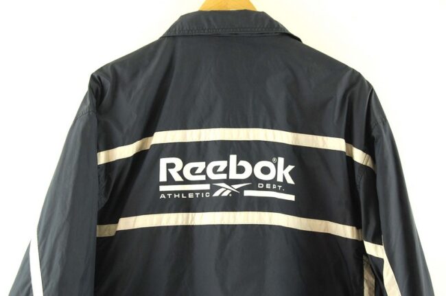 Back of Navy Reebok Athletic Department Jacket