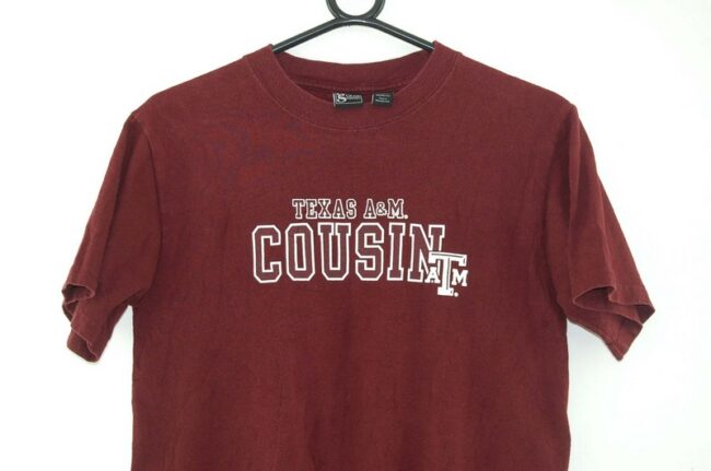 Close up of Texas A & M Cousin Oxblood Tee