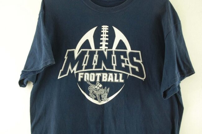 Close up of Mines Football Navy Tee