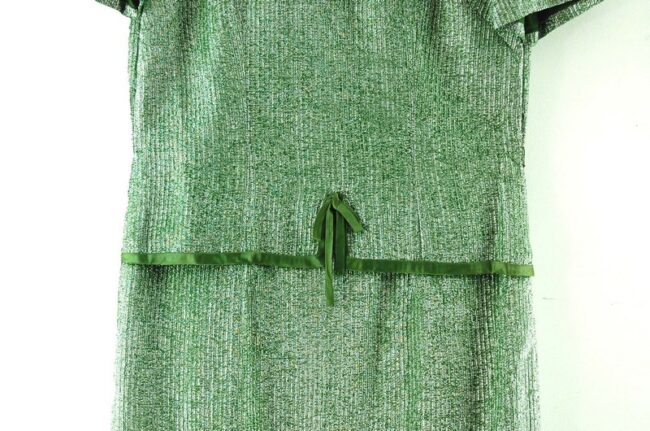 Close up of 1960s Metallic Green Shift Dress