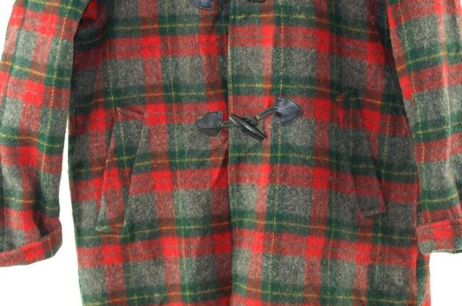 Close up of Womans Tartan Duffel Coat
