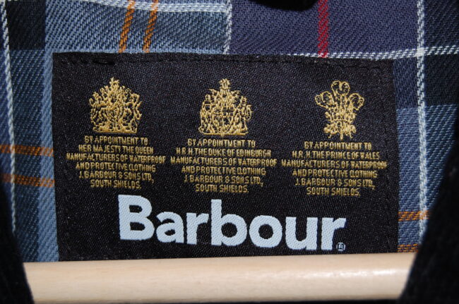 Close up of Black Waxed Cotton Barbour Hardy Peacoat
