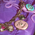 Juicy Couture charms. Image via Wikimedia Commons.