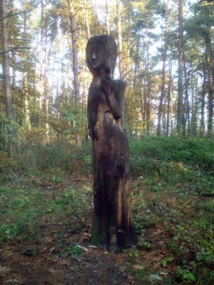 Weaving Goddesses - Wooden statue of Mokosh in the Czech Republic. Image via Wikimedia.