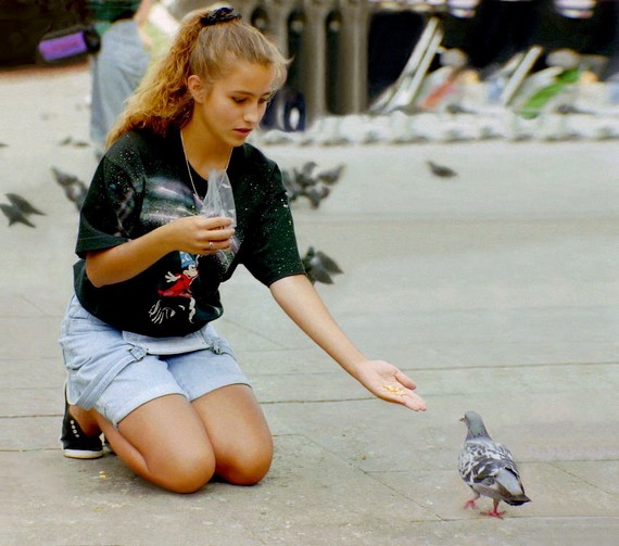 570px - Girl wearing scrunchie at the town square feeding a pigeon, 1993 570px - Girl wearing scrunchie at the town square feeding a pigeon, 1993