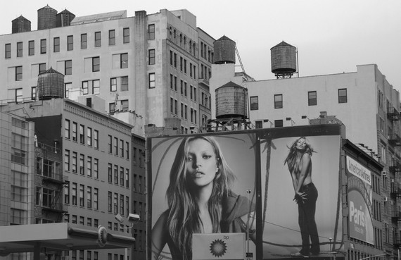 Were 2000s fashions similar to the 90s - Kate Moss billboard on a corner in New York City. Were 2000s fashions similar to the 90s - Kate Moss billboard on a corner in New York City.