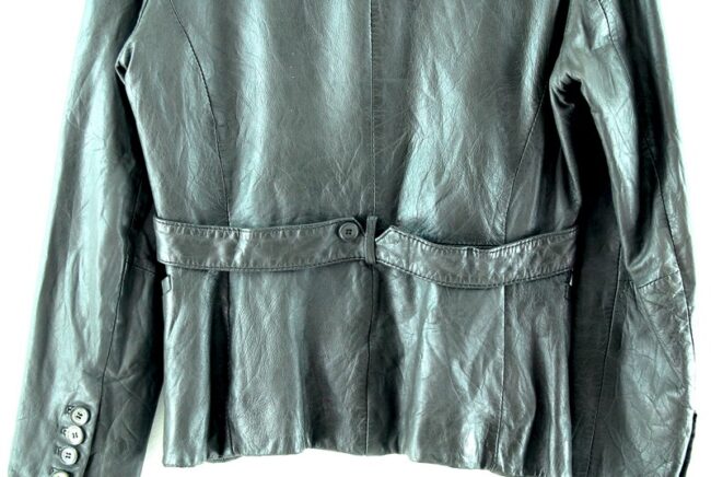 Bottom close up of back Vintage Ladies Grey Leather Jacket
