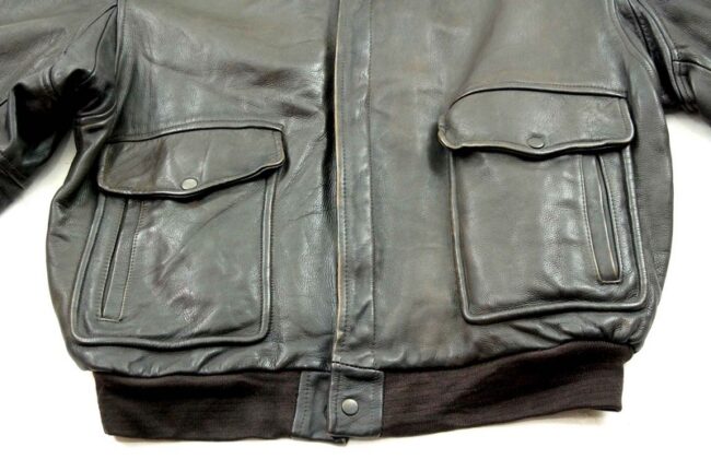 Close up front bottom of Mens Brown Leather Bomber Jacket