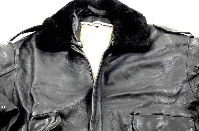 Close up of top, front of Black Vintage Leather Bomber Jacket