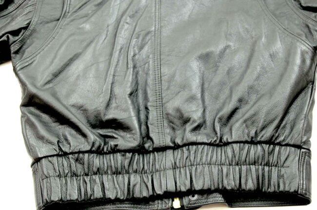 reverse side bottom of black leather bomber jacket