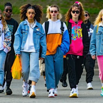 1990s Style For Different Occasions - A group of people wearing 90s-inspired everyday outfits, showcasing grunge, minimalist, and sportswear styles