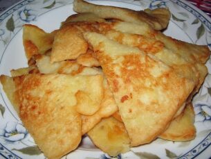 Clothes and shoes recycling - Pancake. Image copyright free via Wikimedia commons. clothes and shoes recycling